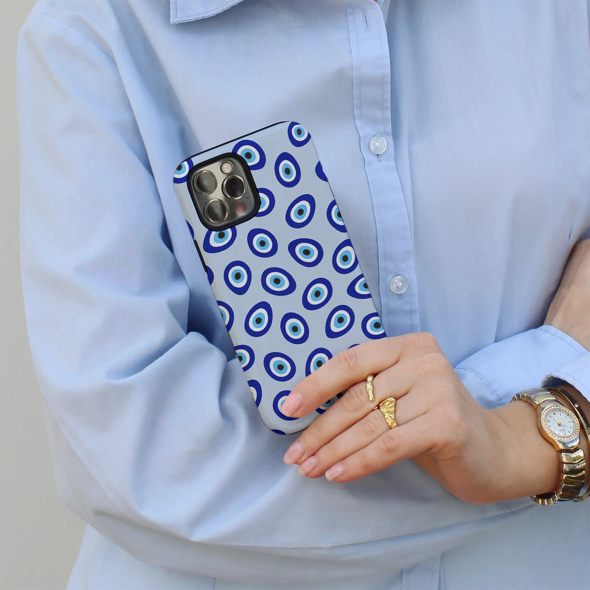 Evil Eye iPhone case — layered blue nazar pattern on a MagSafe shell