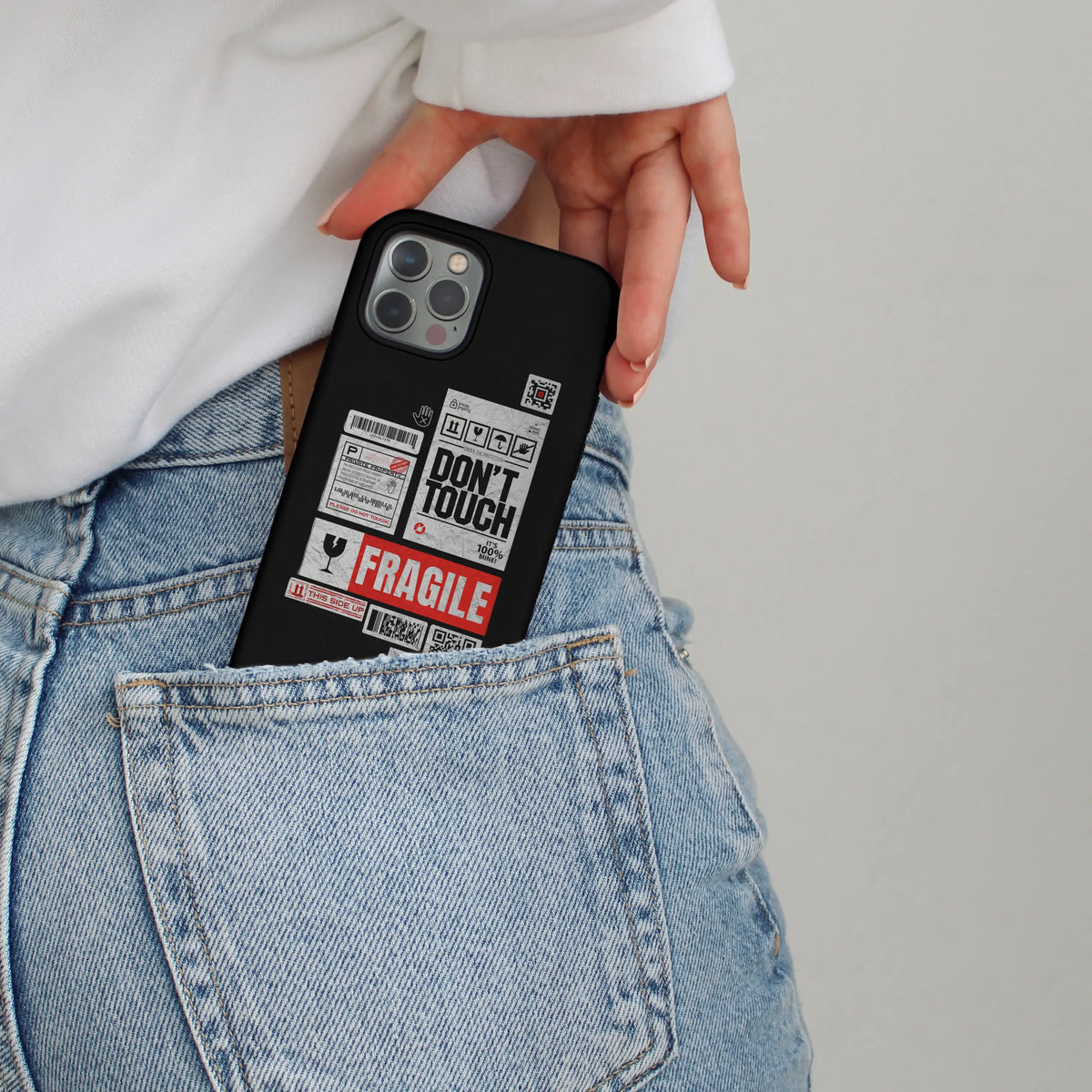 Fragile Ego iPhone case — hand-built lettering on a dual-layer MagSafe shell