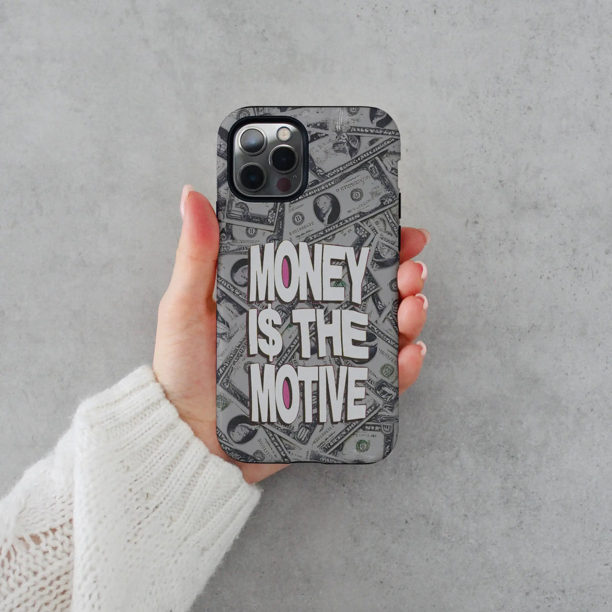 Money i$ The Motive iPhone case — bold statement type on a MagSafe shell