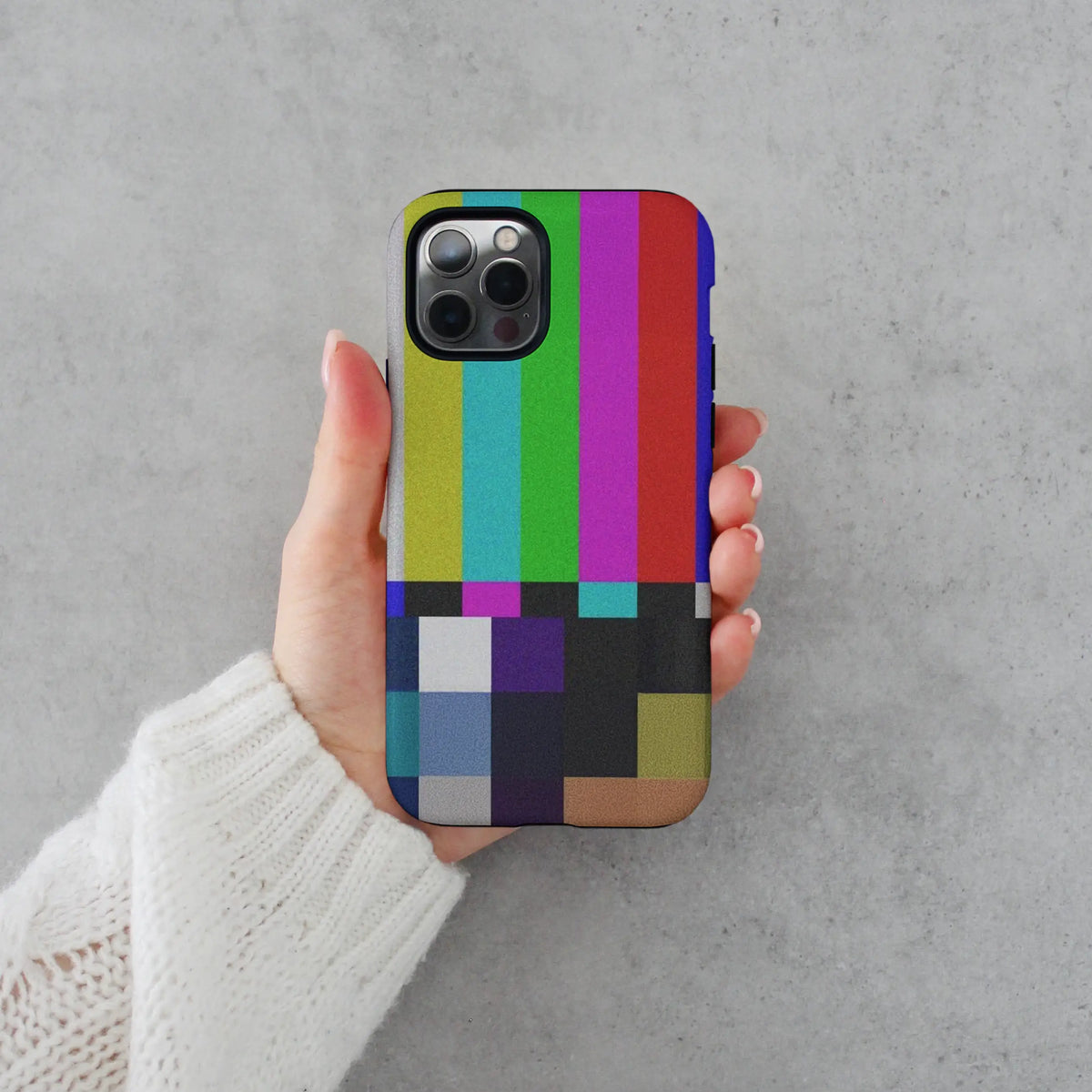 No Signal TV iPhone case — CRT static artwork on a dual-layer MagSafe shell